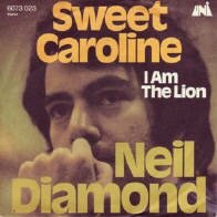 Neil Diamond Vinyl Single 'Sweet Caroline' Schallplatte. 45 rpm record. 'Song sung Blue'. I am I said. Beautiful Nosie. The Jazz Singer. Neil Diamond Schallplatten. Neil Diamond vinyl records. Dischi 33 et 45 tours Neil Diamond. Dischi 33 45 giri Neil Diamond.l skivor. Wurlitzer Jukebox. Musikbox.