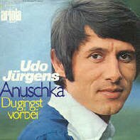 Udo Jrgens Single 'Anuschka'. Vinyl Schallplatte mit Original-Bildhlle. Auch fr Musikboxen und Jukebox wie Wurlitzer oder Seeburg geeeignet. Deutsche Schlager Single auf Vinyl.